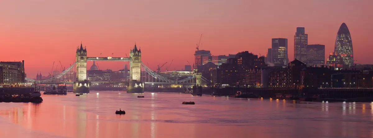 London skyline along the River Thames at sunset